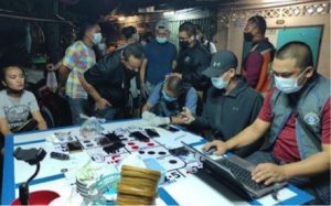 Police in Hong Kong have arrested 65 people aged between 18 and 54 in a raid on an illegal gambling den. Among the people arrested were three people suspected of running the underground poker room. One of them is a police officer.
