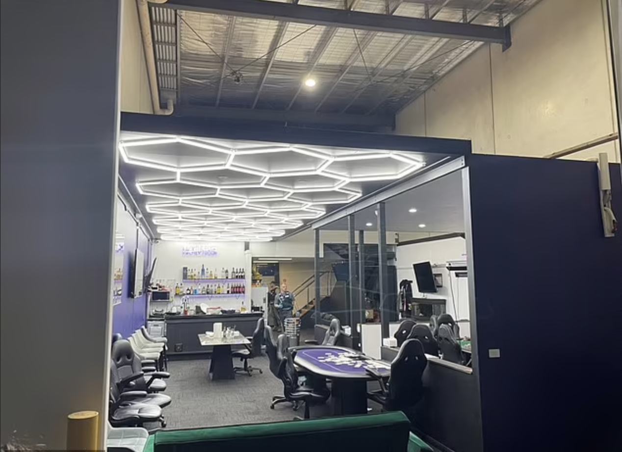Melbourne police arrest 21 after discovering illegal high-end casino.